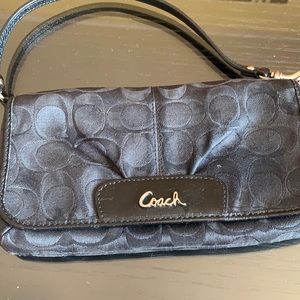Coach wristlet , used but in a very good condition
